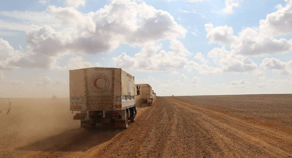 مركز المصالحة: واشنطن ترفض السماح لقوافل النقل بالعبور إلى التنف لنقل اللاجئين