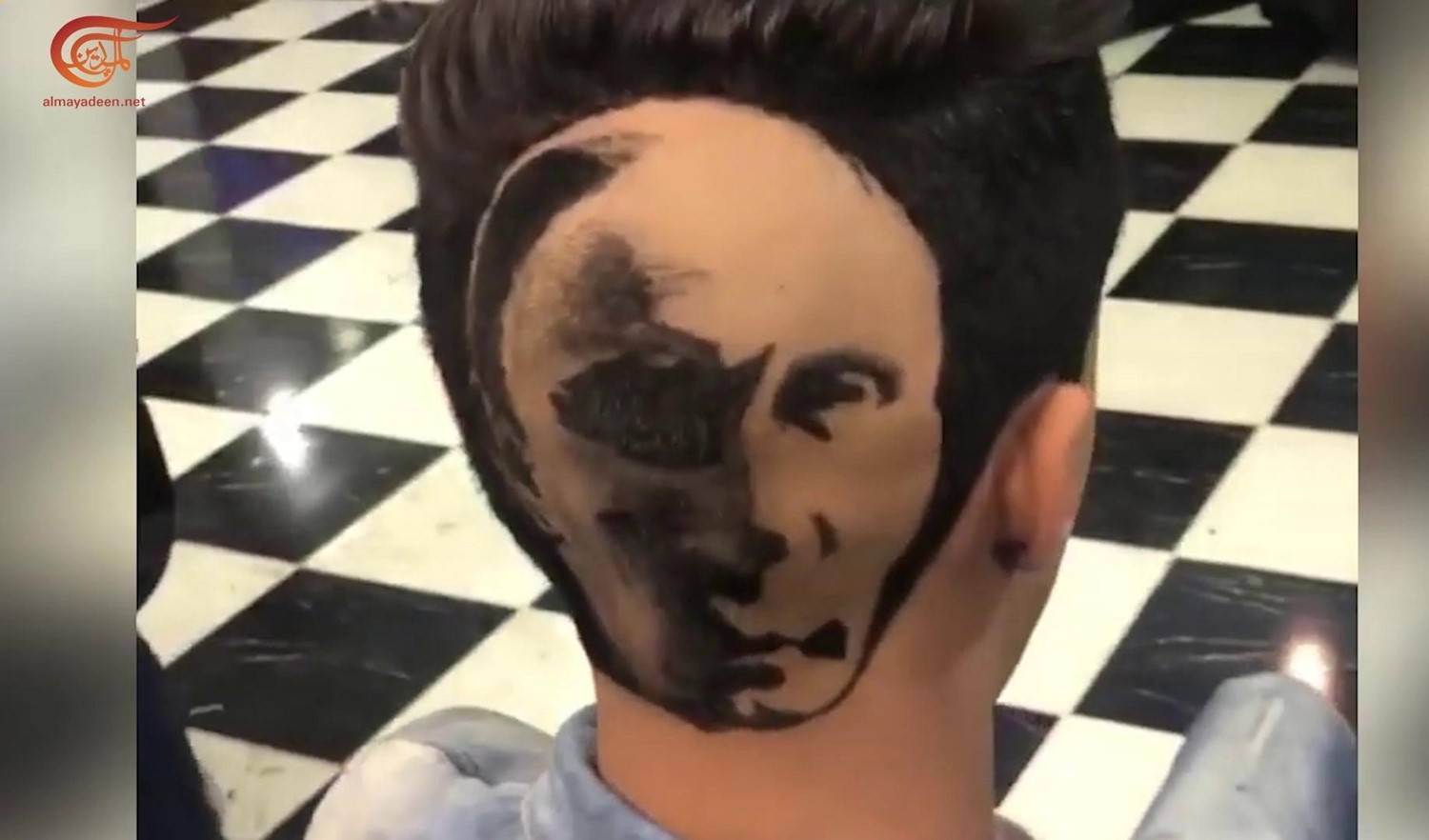 حلاق ليبي يرسم وجه بوتين على رؤوس زبائنه