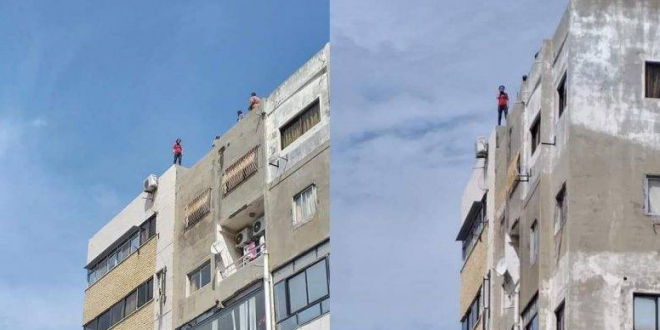 سيدة تحاول رمي نفسها من سطح بناء لهذا السبب.. و المحافظ يتدخل!