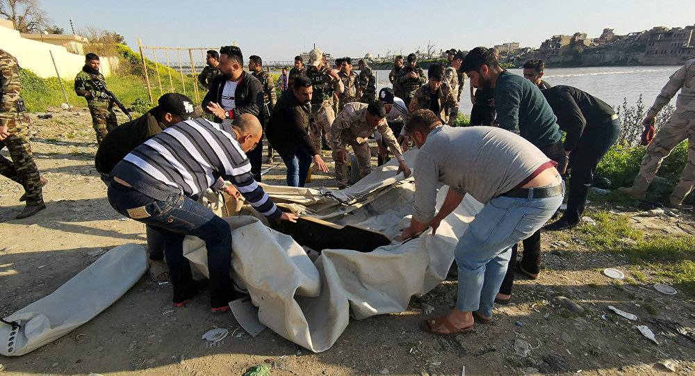 حصيلة رفع الجثث من تحت الماء في العراق