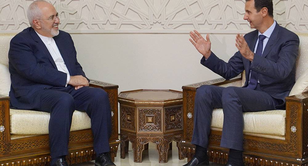 ما الذي دار في لقاء ظريف والأسد ؟