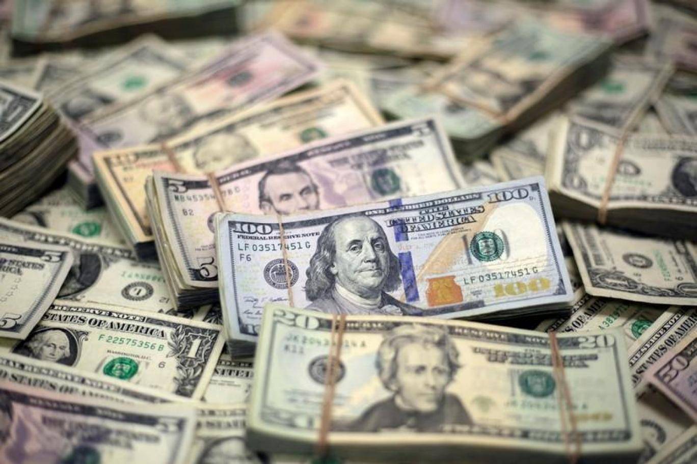الدولار يعزز صعوده وسط تحسن الإقتصاد الأميركي