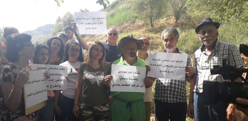 لقاء في خراج بسري رفضا لمشروع السد