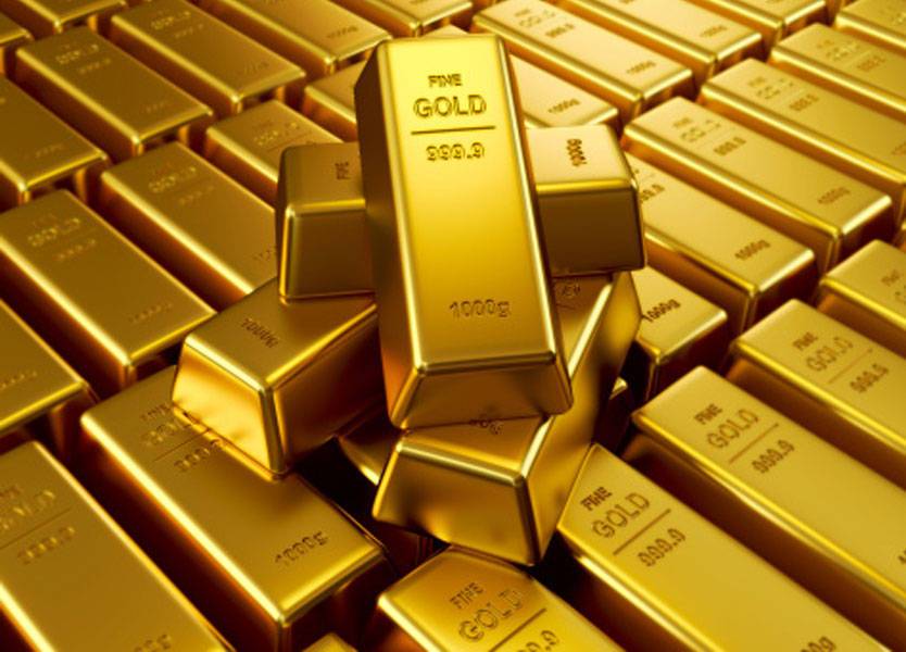 الذهب ينخفض مع صعود الدولار والأنظار على محادثات التجارة