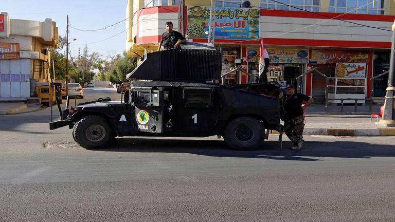 مذكرة قبض بحق متظاهرة مجدت "صدام حسين" في كركوك
