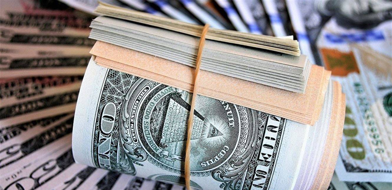 بريطانيا: الاقتصاد العالمي يحتاج إلى بديل للدولار الأميركي