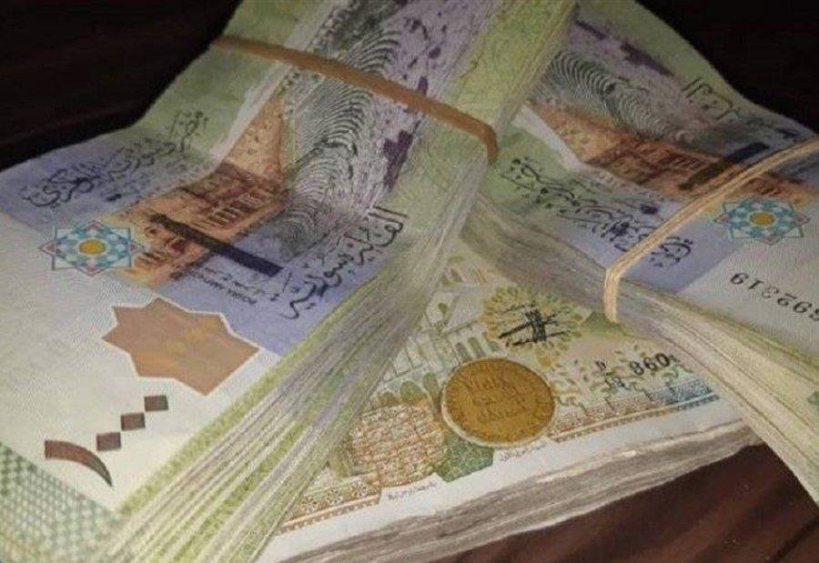 الليرة السورية تهبط الى مستوى قياسي