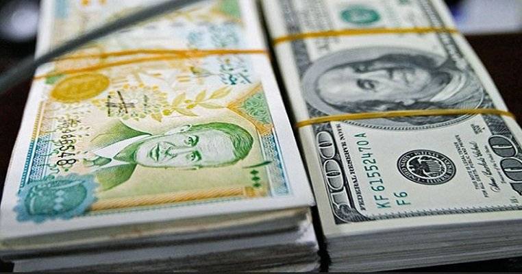 الليرة السورية تتحسن أمام الدولار
