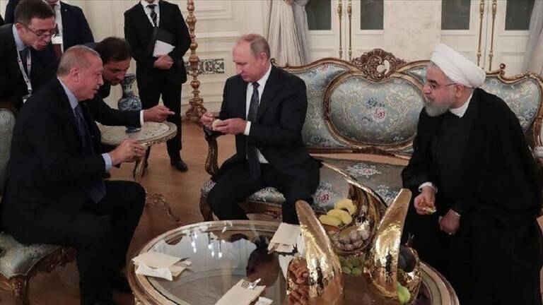 بالصور.. أردوغان يضيف بوتين وروحاني التين التركي في أنقرة