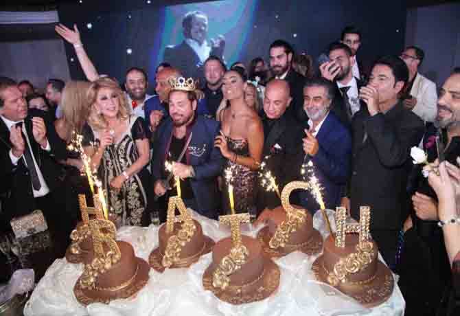 بحفل راقٍ، د. هراتش احتفل ملكًا بعيد ميلاده وناديا الجندي شاركته فرحته