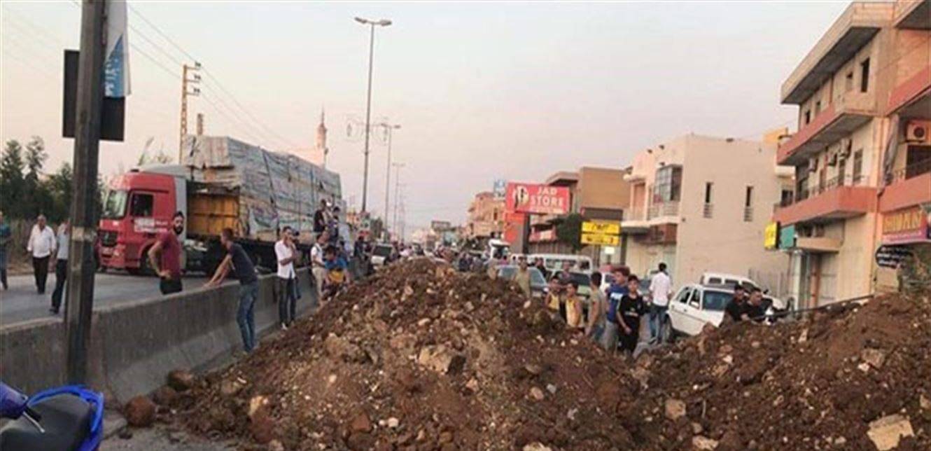 اعادة فتح الطريق الدولية في المنية