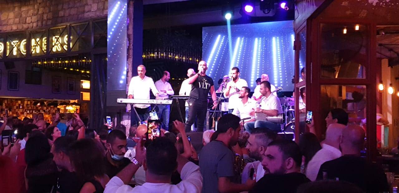 بالفيديو: ناجي الأسطا يتحدّى كلَ الظروف ويشعل قلوب جمهوره الضخم!