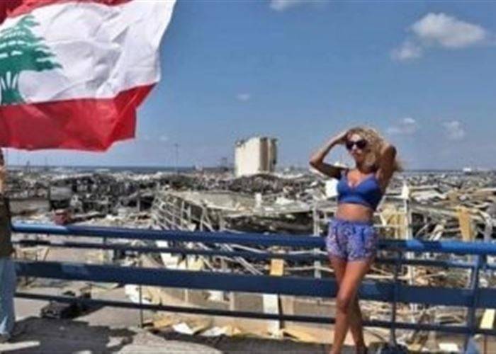 فتاة بملابس مكشوفة تخضع لجلسة تصوير على أنقاض بيروت!