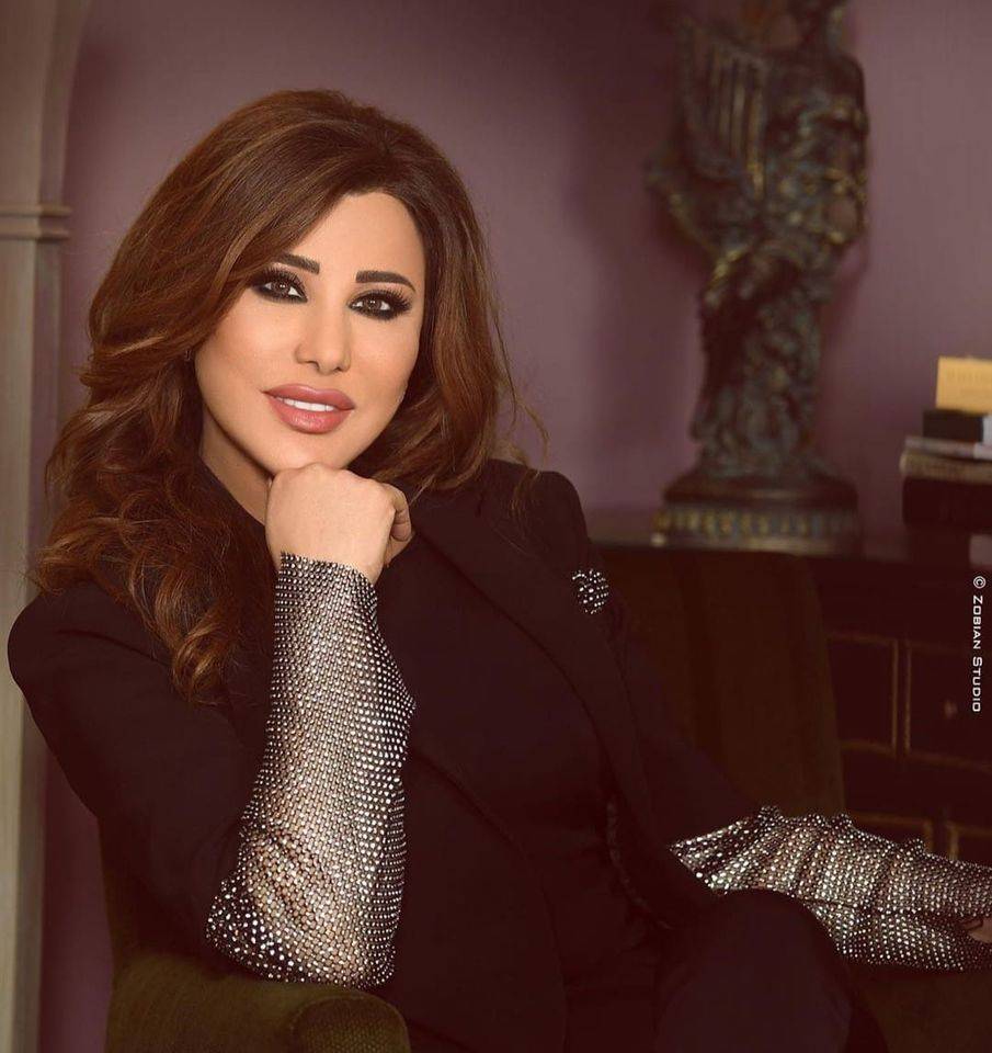نجوى كرم حسمت قرارها بالهجرة؟؟
