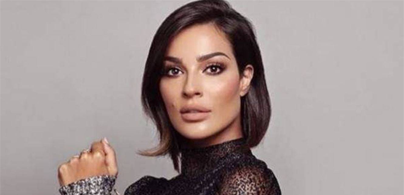 في أول ظهور لوجهها كاملاََ بعد الإنفجار.. نادين نسيب نجيم مع أطفالها