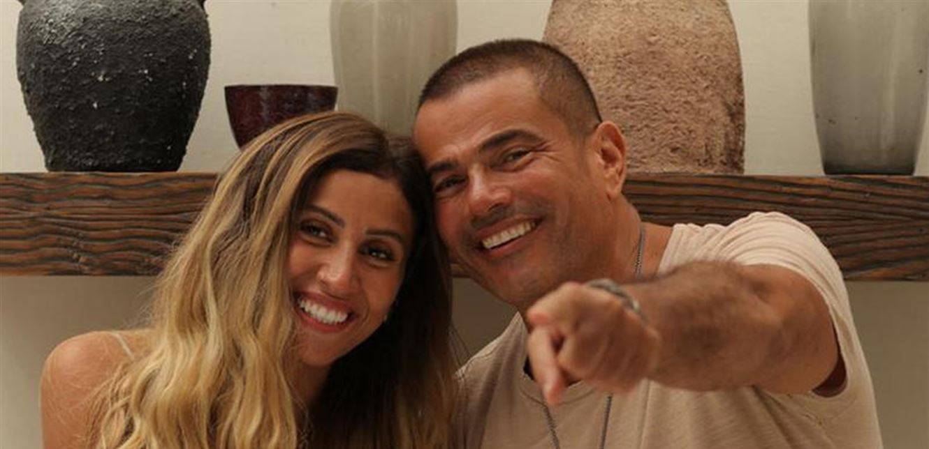 عمرو دياب سيعلن عن مفاجأة تخص دينا الشربيني يوم 11 تشرين الاول.. هل سيتزوجا؟