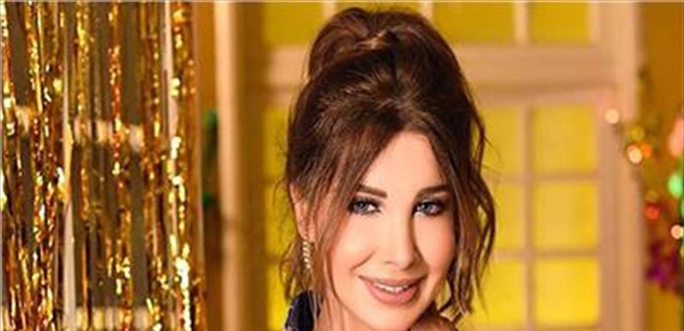 وقفت فجأة خلال لقاء وبدأت بالرقص.. شاهدوا عفوية نانسي عجرم (فيديو)