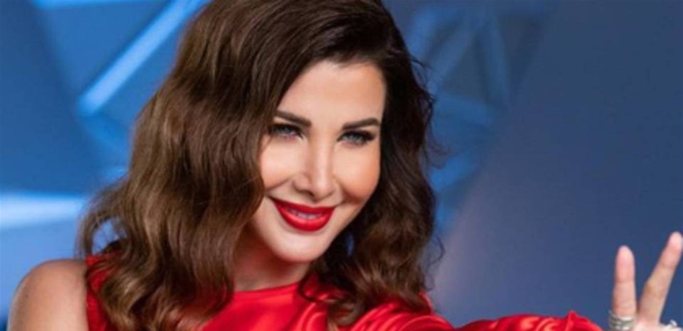 شاهدوا كيف أخذت نانسي عجرم ترقص خلال مقابلة