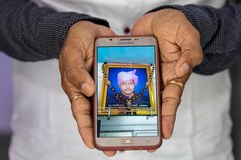 The faces of India's coronavirus pandemic as deaths hit 100000