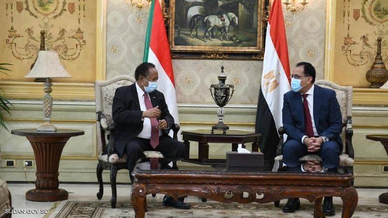 حمدوك يبحث مع مدبولي تطوير العلاقات بين مصر والسودان