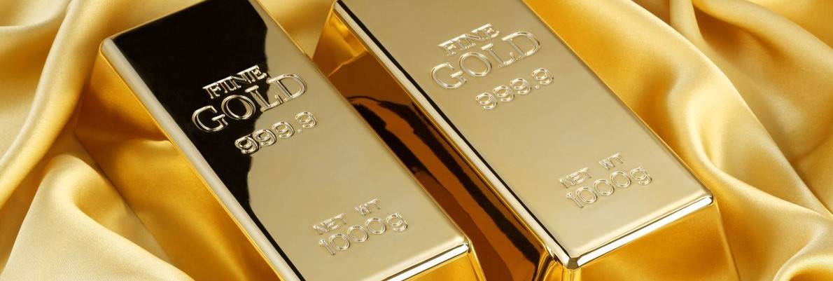 الذهب يبلغ أعلى مستوى في أسبوع مع تراجع العوائد والدولار الأميركي