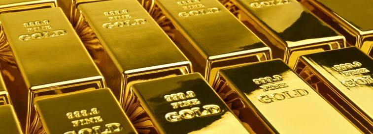 الذهب يتراجع بفعل قوة الدولار