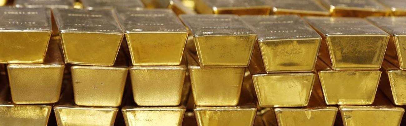 أسعار الذهب تستقر بعد زيادة مبكرة