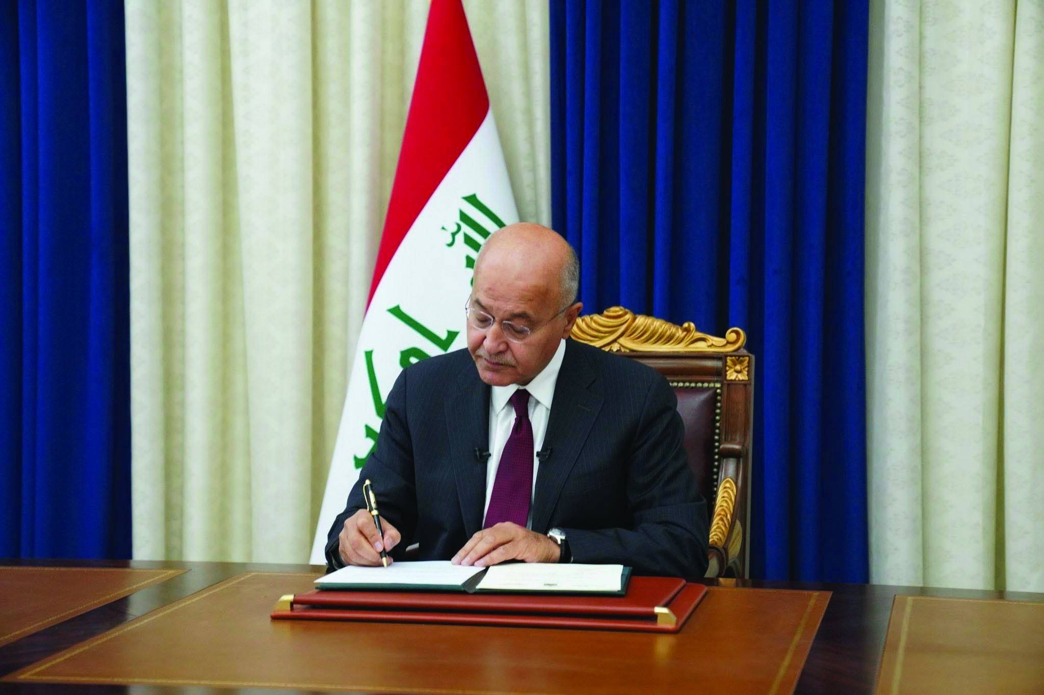 الرئيس العراقي يوقع مرسوماً بإجراء الانتخابات النيابية المبكرة