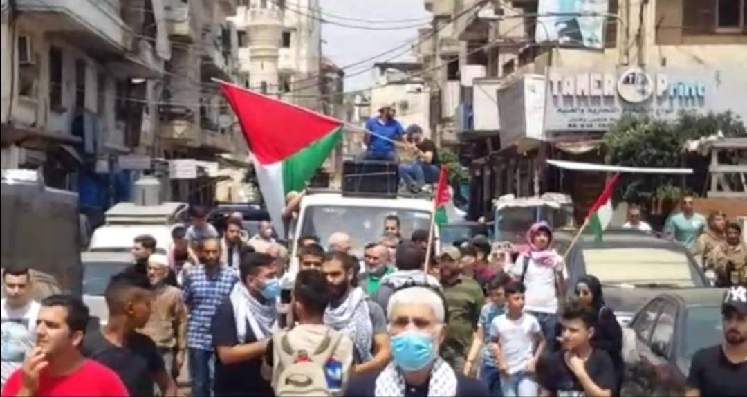 مسيرة جابت شوارع طرابلس احتفالا بالنصر الذي حققتة المقاومة