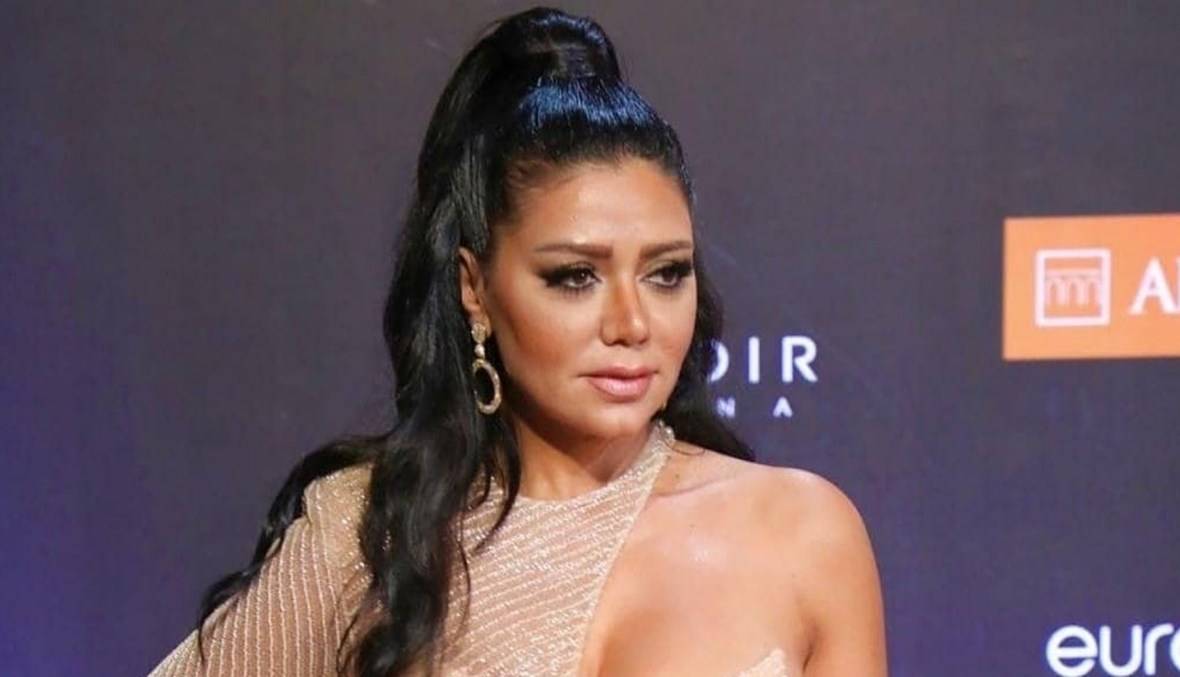 رانيا يوسف من برشلونة مع "أجمد رئيس نادي"