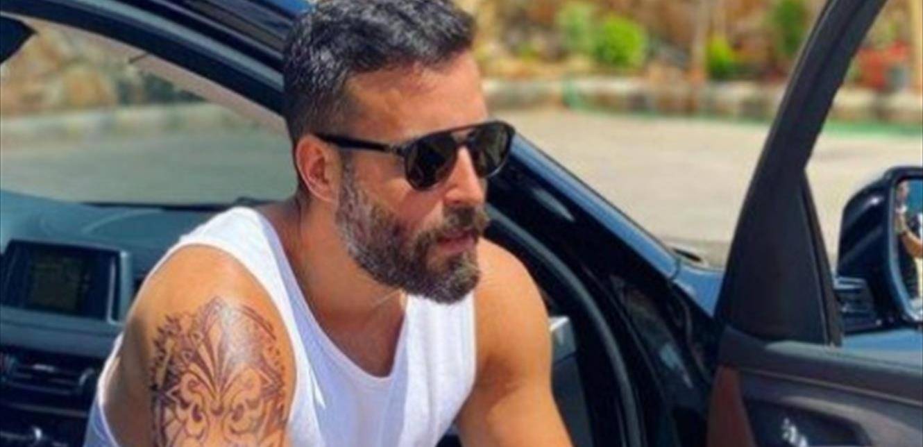 سعد رمضان يظهر بوشم كبير على ذراعه.. الجمهور ينتقده بشدّة وهذا ما أوضحه! (فيديو)