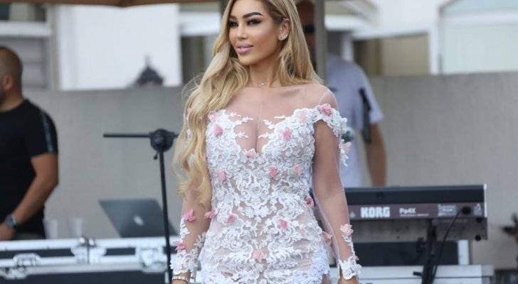 نورهان تفتتح موسم الصيف بفستان شفاف في حفل Miss World next top model 2021