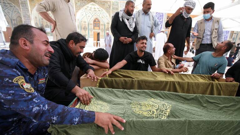عشرات الجثث لا تزال مجهولة الهوية في حريق مستشفى الحسين