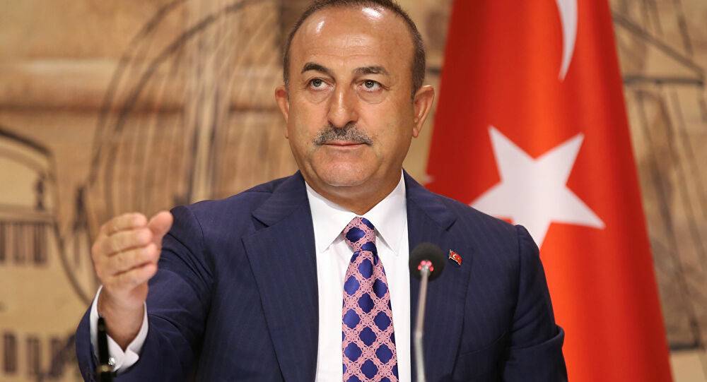 جاويش أوغلو يندد بالوجود الأميركي في سوريا