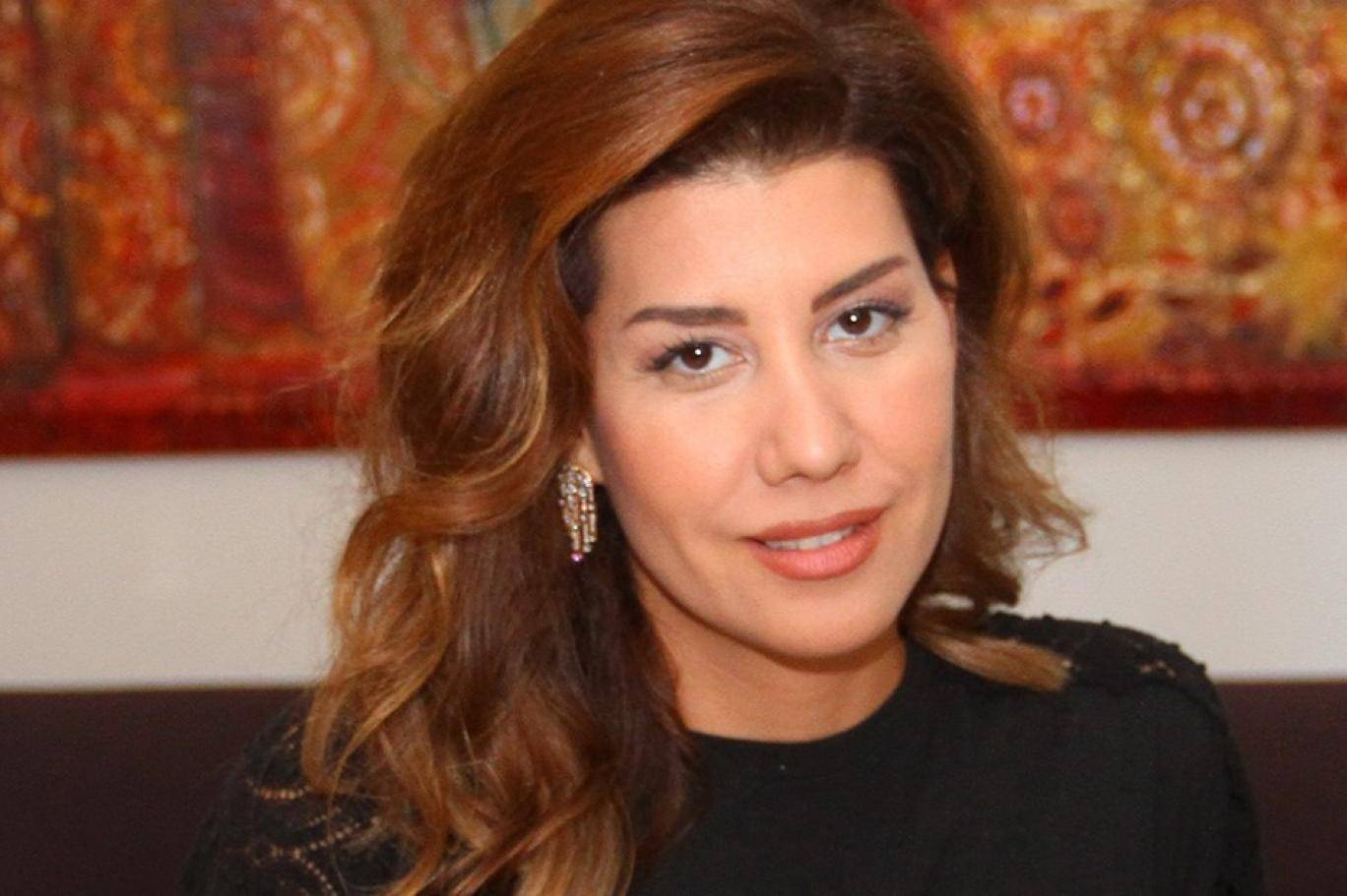 تمزيق صورة لبولا يعقوبيان في الأشرفية