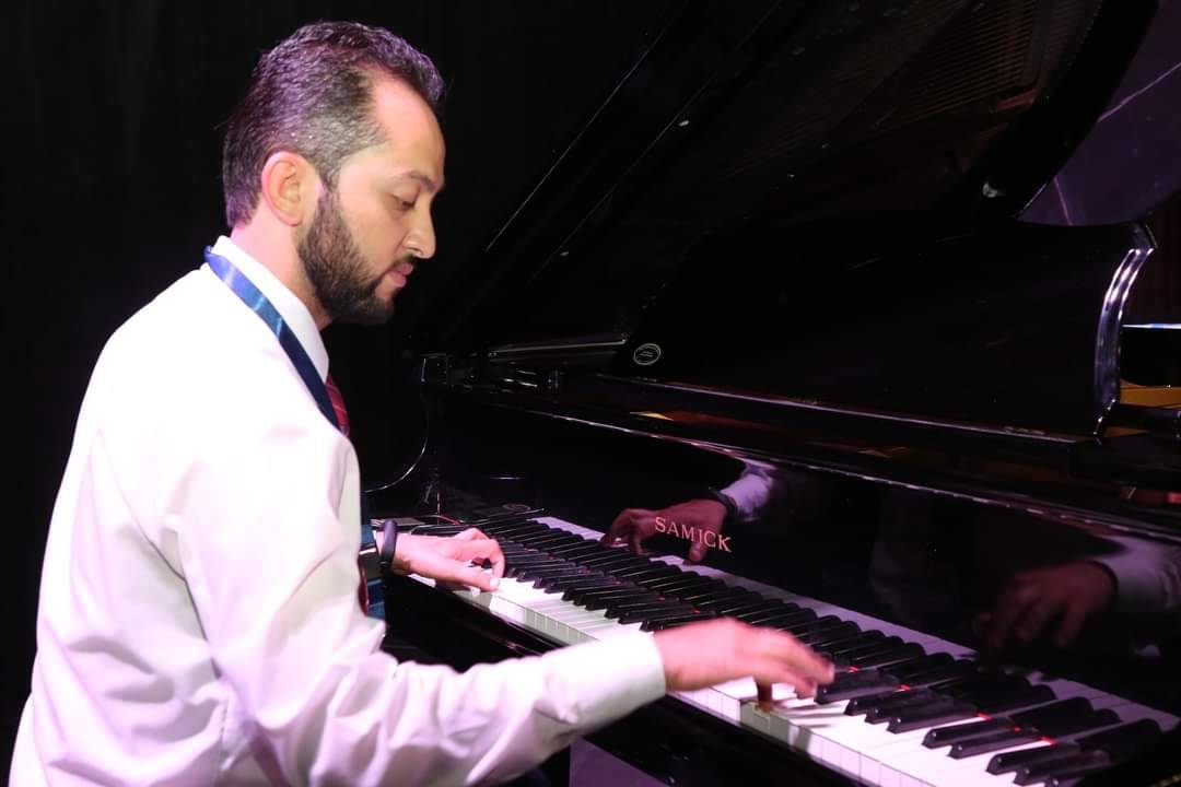 أحمد أبو عابد يفوز بالمركز الأول في المسابقه العالميه في التأليف الموسيقي موسيقية