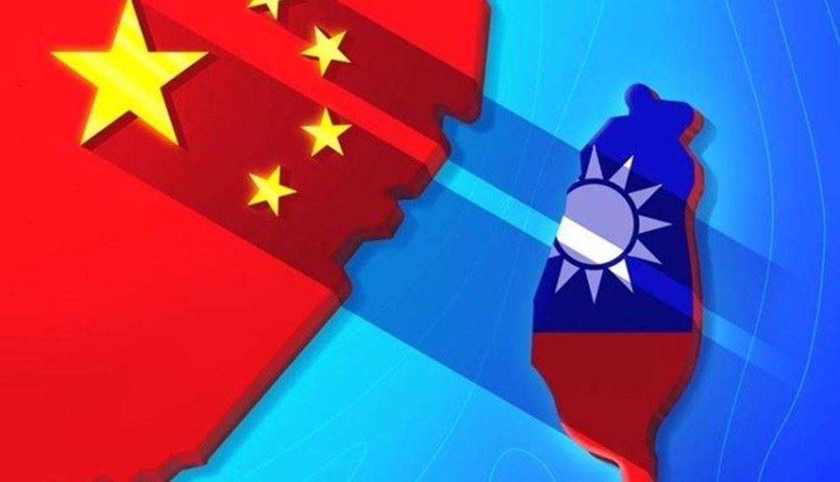 في العيد الوطني للصين
 تايوانيون يرفعون علمها وآخرون يحرقونه