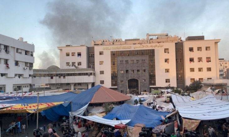دفن الجثث في قبر جماعي داخل مستشفى الشفاء بغزة.. والصحة العالمية تصف المستشفى "بالمقبرة"