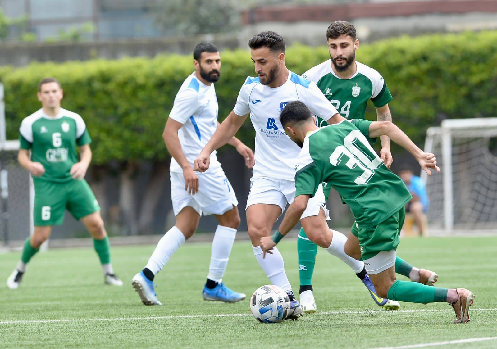 الأنصار يتعادل مع الراسينغ ويستعيد الصدارة