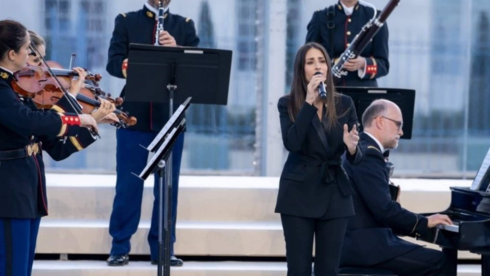 بحضور ماكرون وزوجته... هبة طوجي تغني 