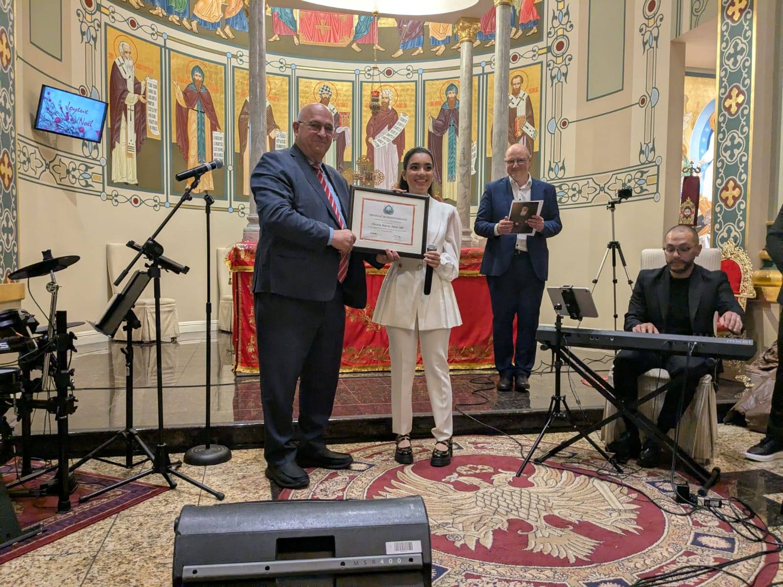 شهادة تقدير دولية لكريستا ماريا أبو عقل من الفيدرالية العالمية للسلام (Universal Peace Federation)