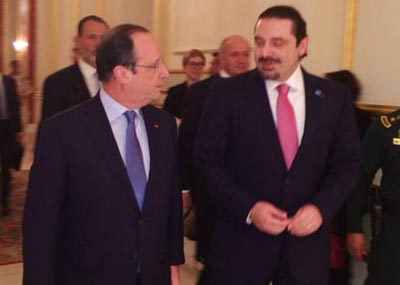 هولاند بحث مع عبدالله والحريري أوضاع المنطقة