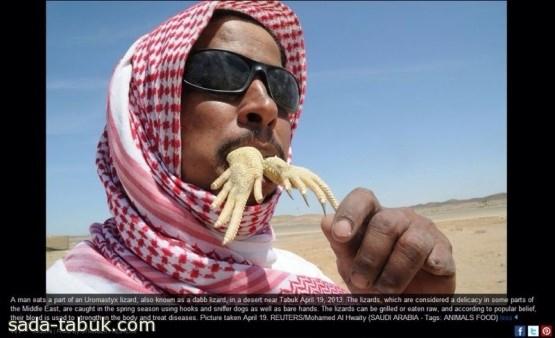 رجل سعودي يأكل الضب ضمن أغرب صور 2013