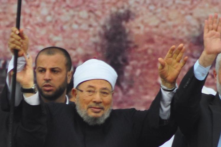  ضاحي خلفان: القرضاوي مرشد الإخوان السري و"شيخ الفتنة"