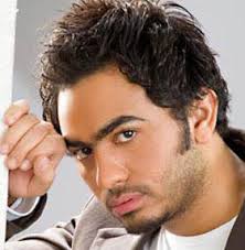 تامر حسني يدعم زينة في مواجهة أحمد عز!