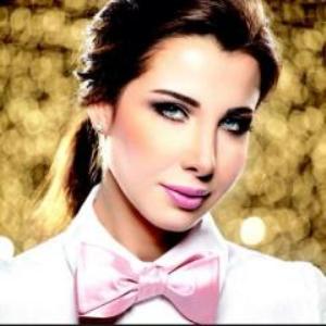 بالصورة-نانسي عجرم مبهرة على الغلاف الخلفي لألبومها الجديد