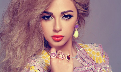بالصور-ميريام فارس تتمتع يثلوج موسكو مع شقيقتها!