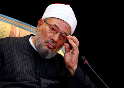 القرضاوي : أنا جزء من قطر