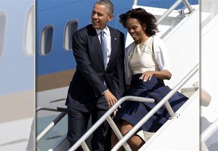  بالصور.. أوباما ينقذ ميشيل من موقف محرج بسبب 