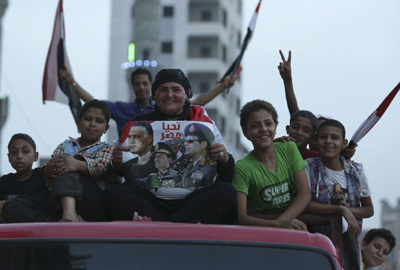 تهاني عربية للسيسي
واوباما يتطلع للعمل معه